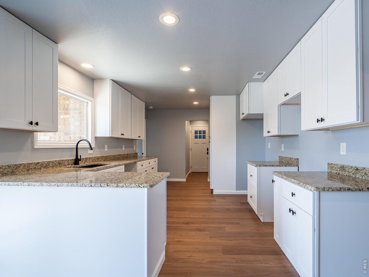 36301 Appy Road Eaton, CO 80615 - Photo 4 of 36 Beautiful kitchen, granite counter tops, access to patio