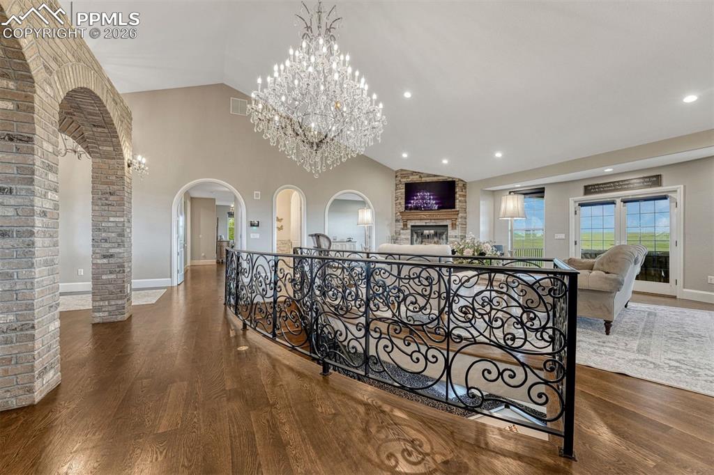 25995 Cave Spg Trail Elbert, CO 80106 - Photo 13 of 50 a view of a livingroom with furniture window and wooden floor