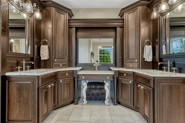 a kitchen with stainless steel appliances granite countertop a stove and a sink