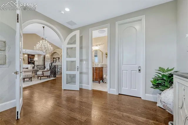 a view of a livingroom with furniture and a potted plant