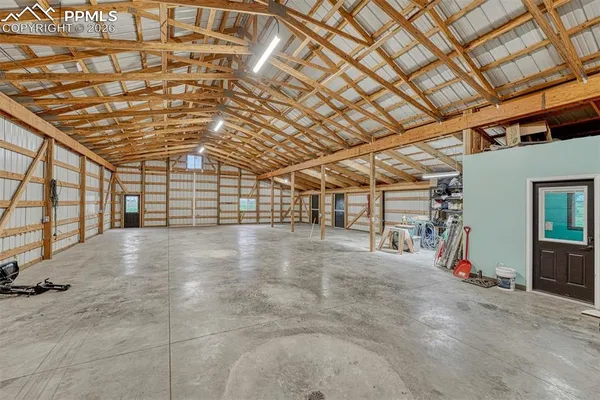 a view of a room with wooden walls