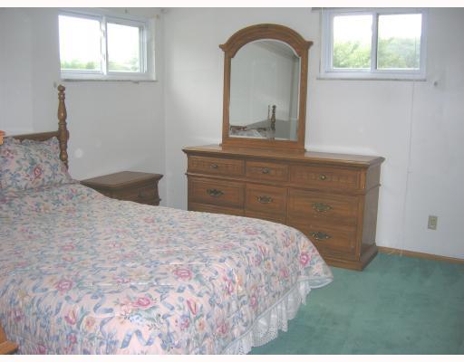 Other. Large bedroom with hardwood floors under the carpeting can accomodate all of your furniture.