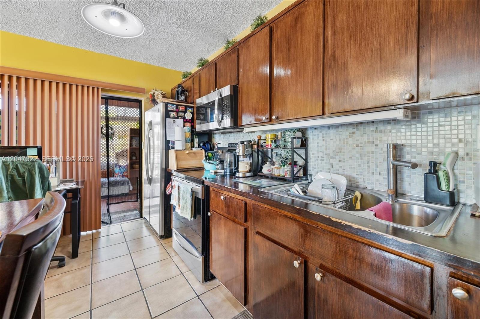 5800 Southwest 20th Street Miami, FL 33155 - Photo 5 of 24 Downstairs