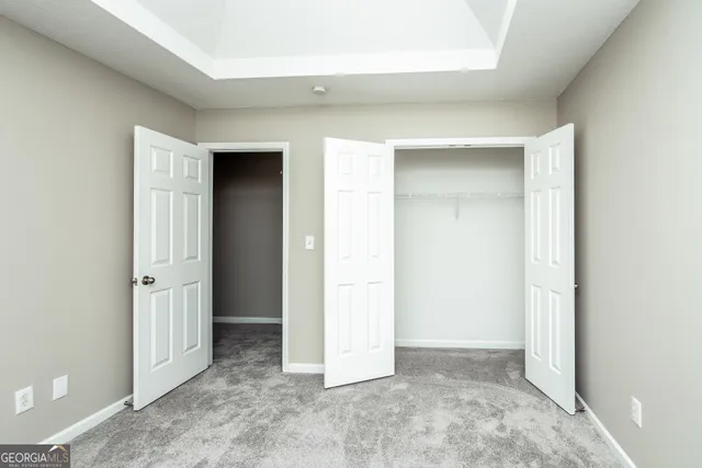 an empty room with closet