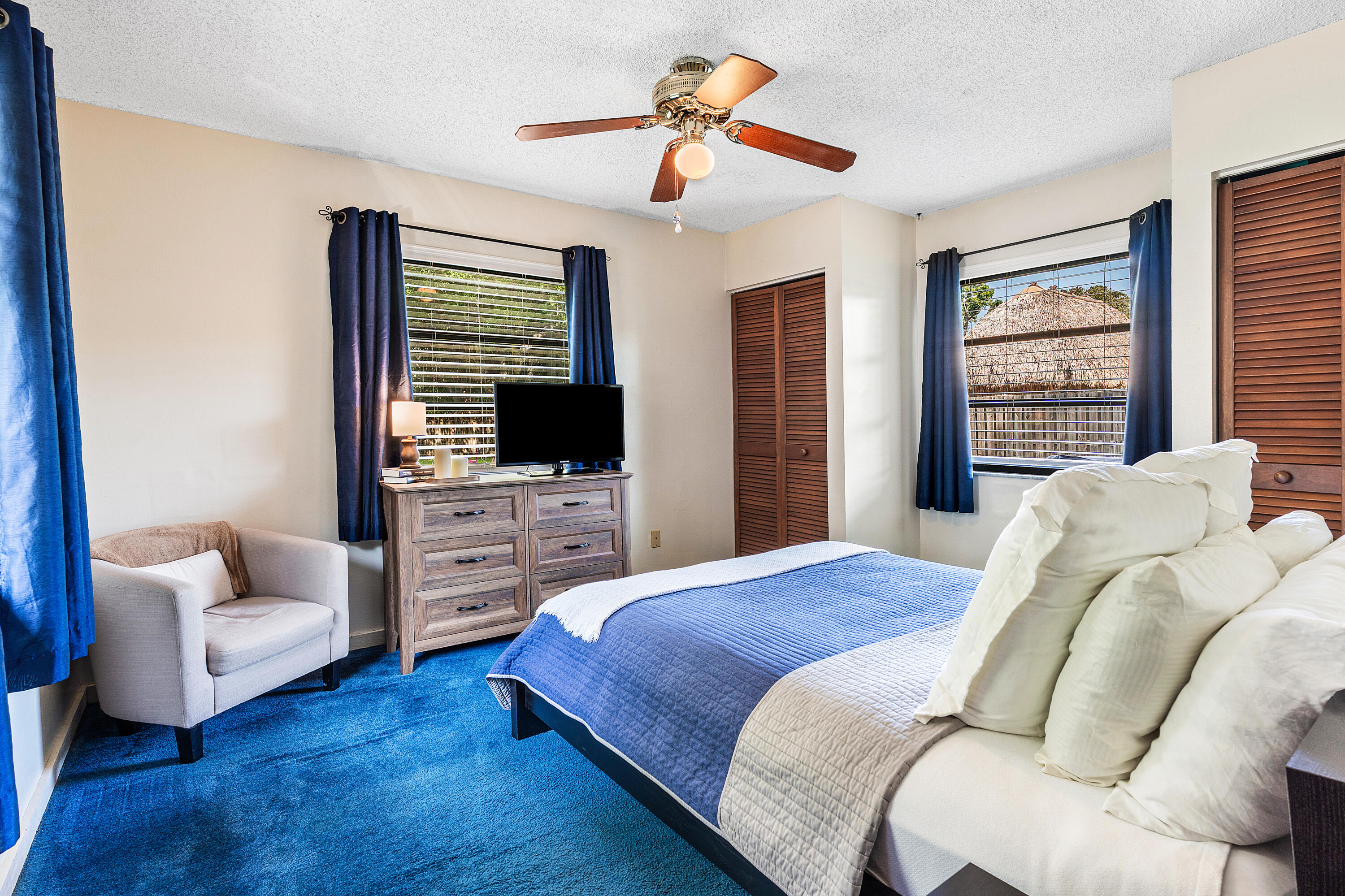 267 Old Country Road South Wellington, FL 33414 - Photo 13 of 22 a bedroom with a bed and a flat screen tv