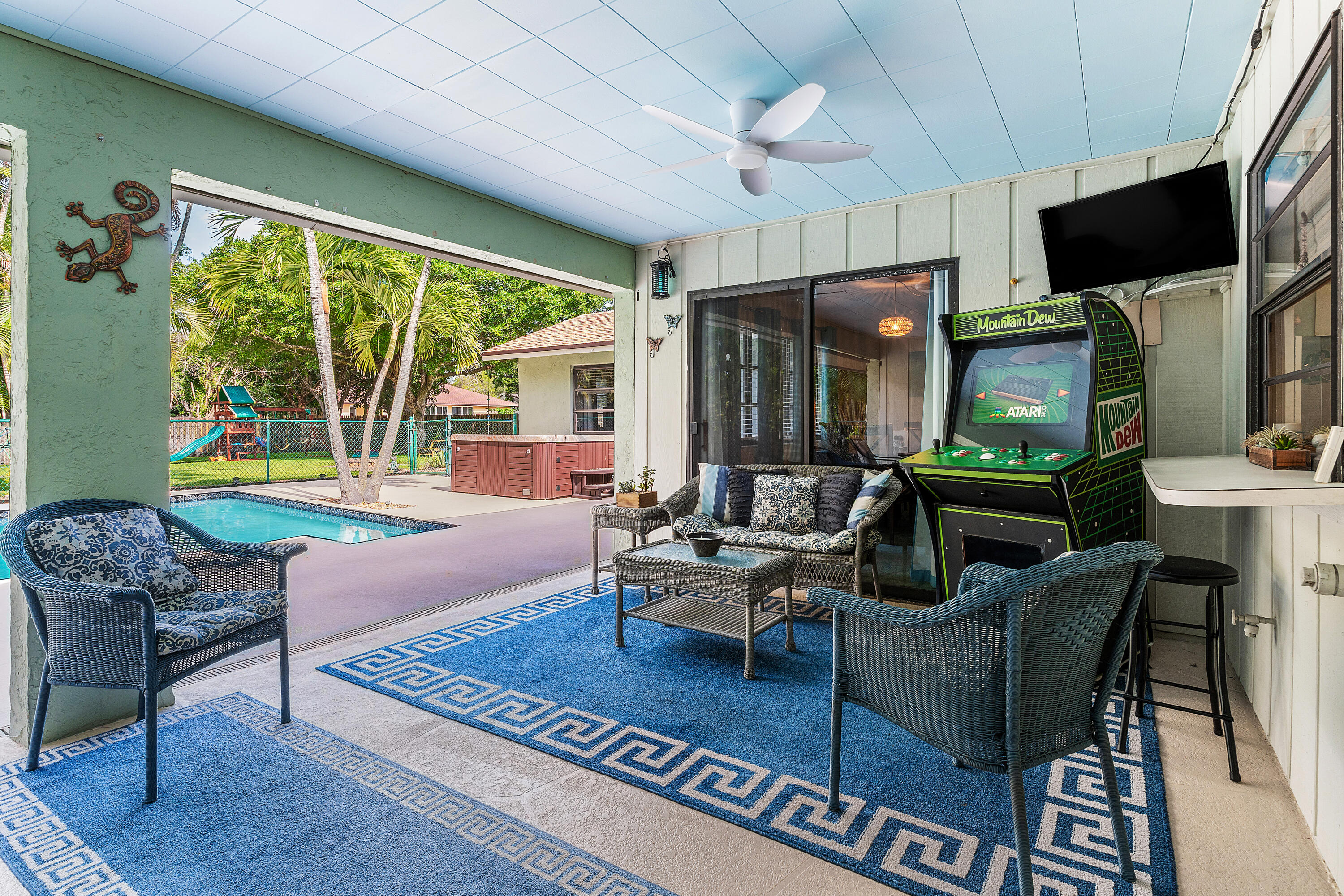 267 Old Country Road South Wellington, FL 33414 - Photo 17 of 22 a living room with fireplace furniture and a large window