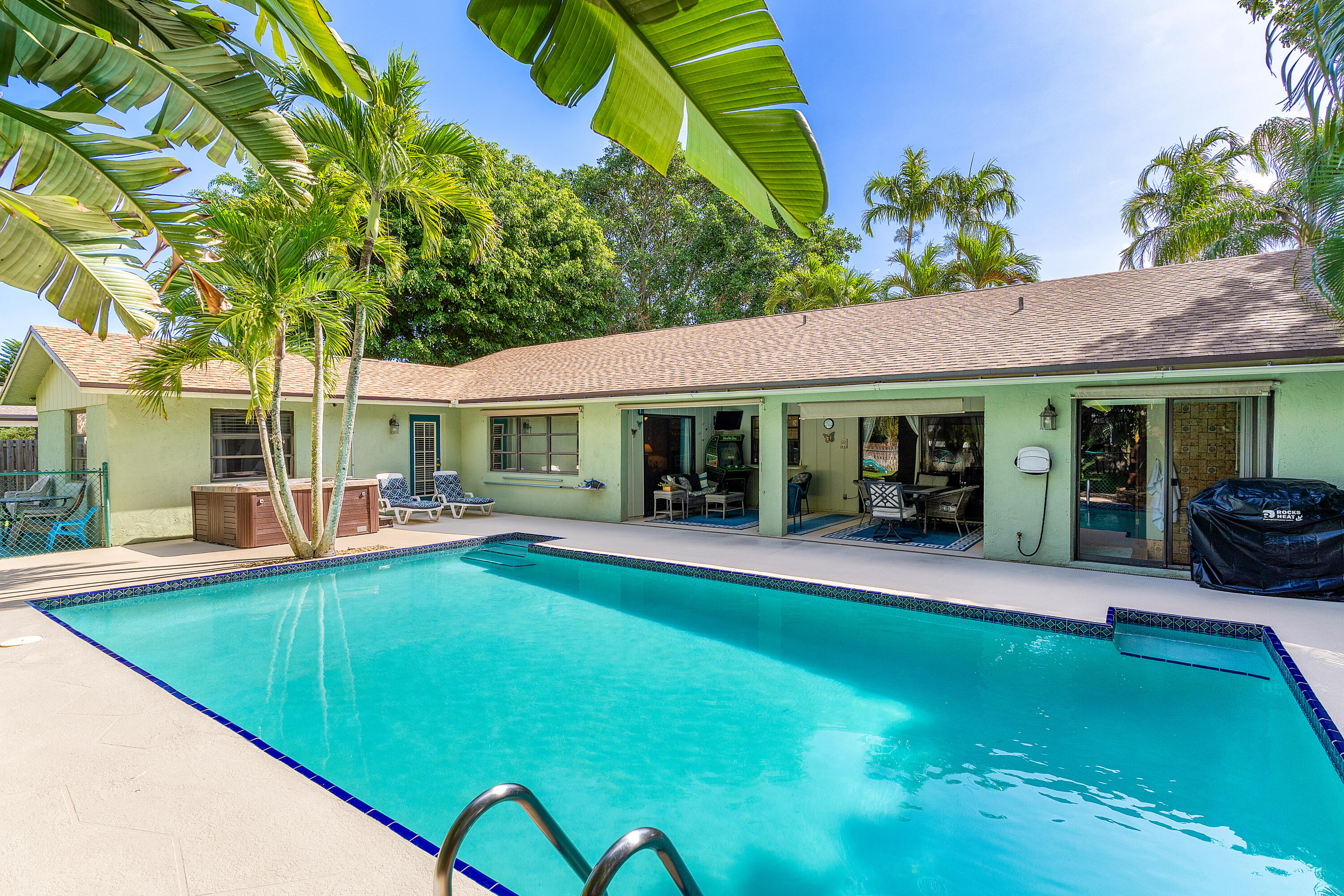 267 Old Country Road South Wellington, FL 33414 - Photo 19 of 22 a view of a house with swimming pool