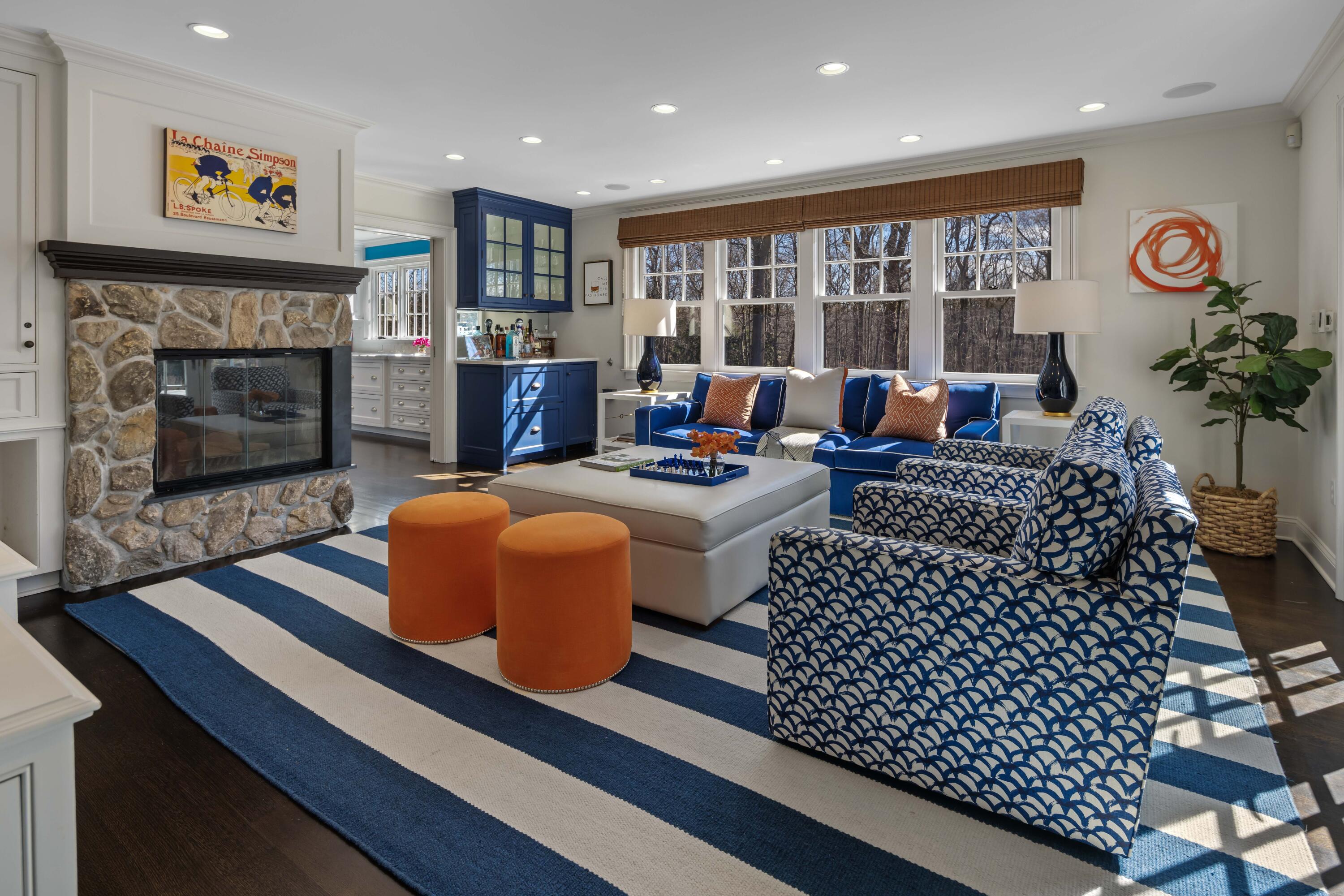 8 Hanson Road Darien, CT 06820 - Photo 11 of 38 a living room with furniture fireplace and a flat screen tv