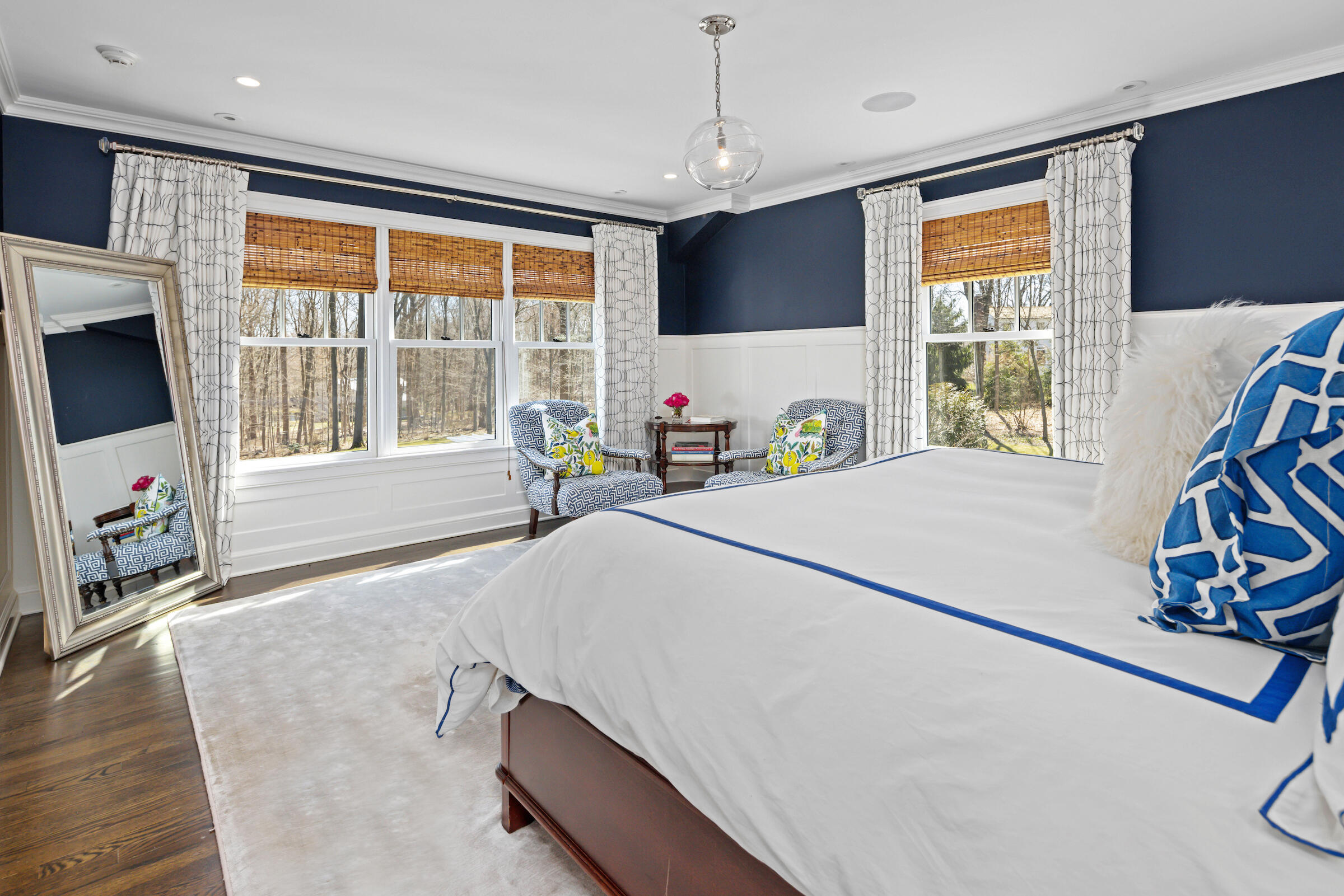 8 Hanson Road Darien, CT 06820 - Photo 17 of 38 a bedroom with furniture and a flat screen tv