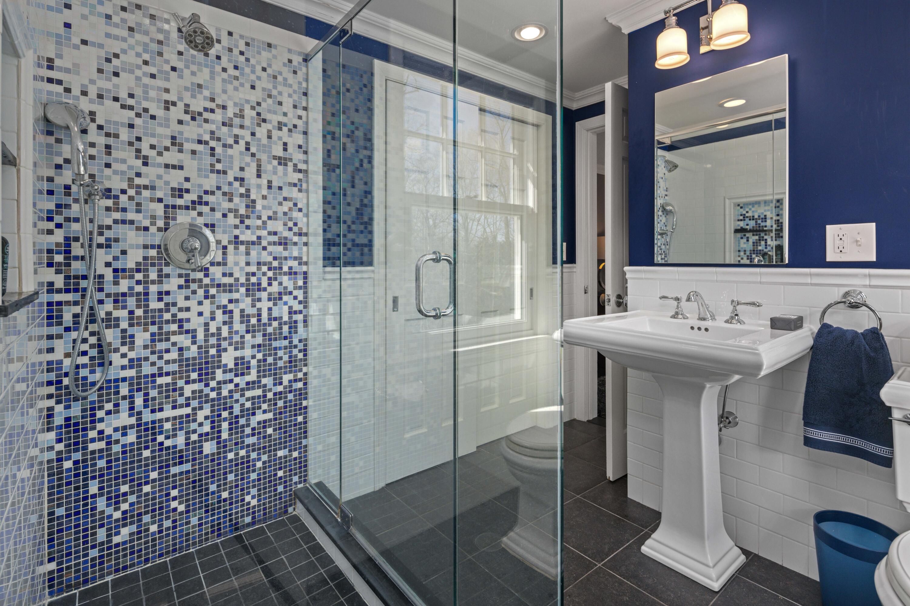 8 Hanson Road Darien, CT 06820 - Photo 21 of 38 a bathroom with a sink toilet and shower