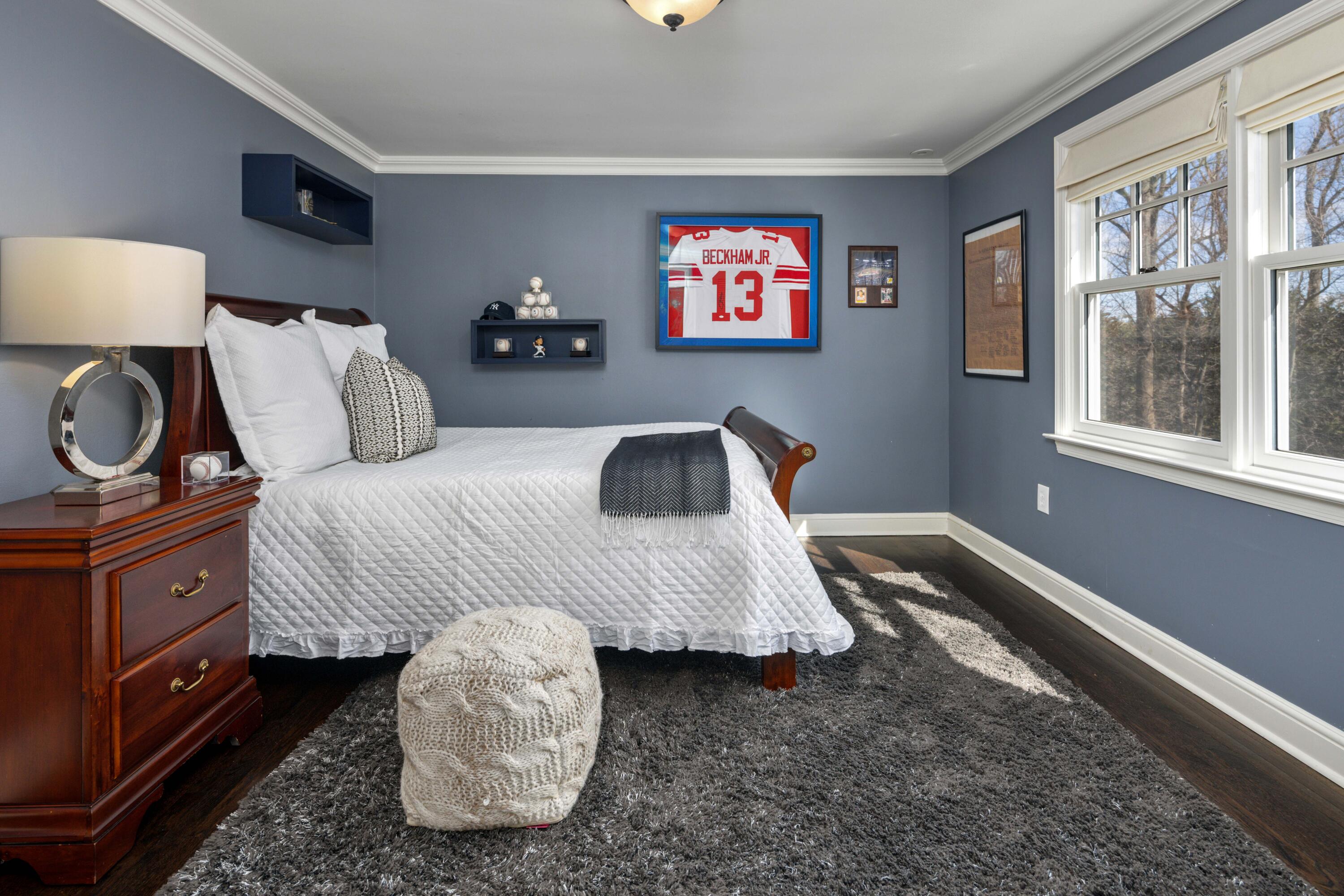 8 Hanson Road Darien, CT 06820 - Photo 22 of 38 a bedroom with a bed and dresser