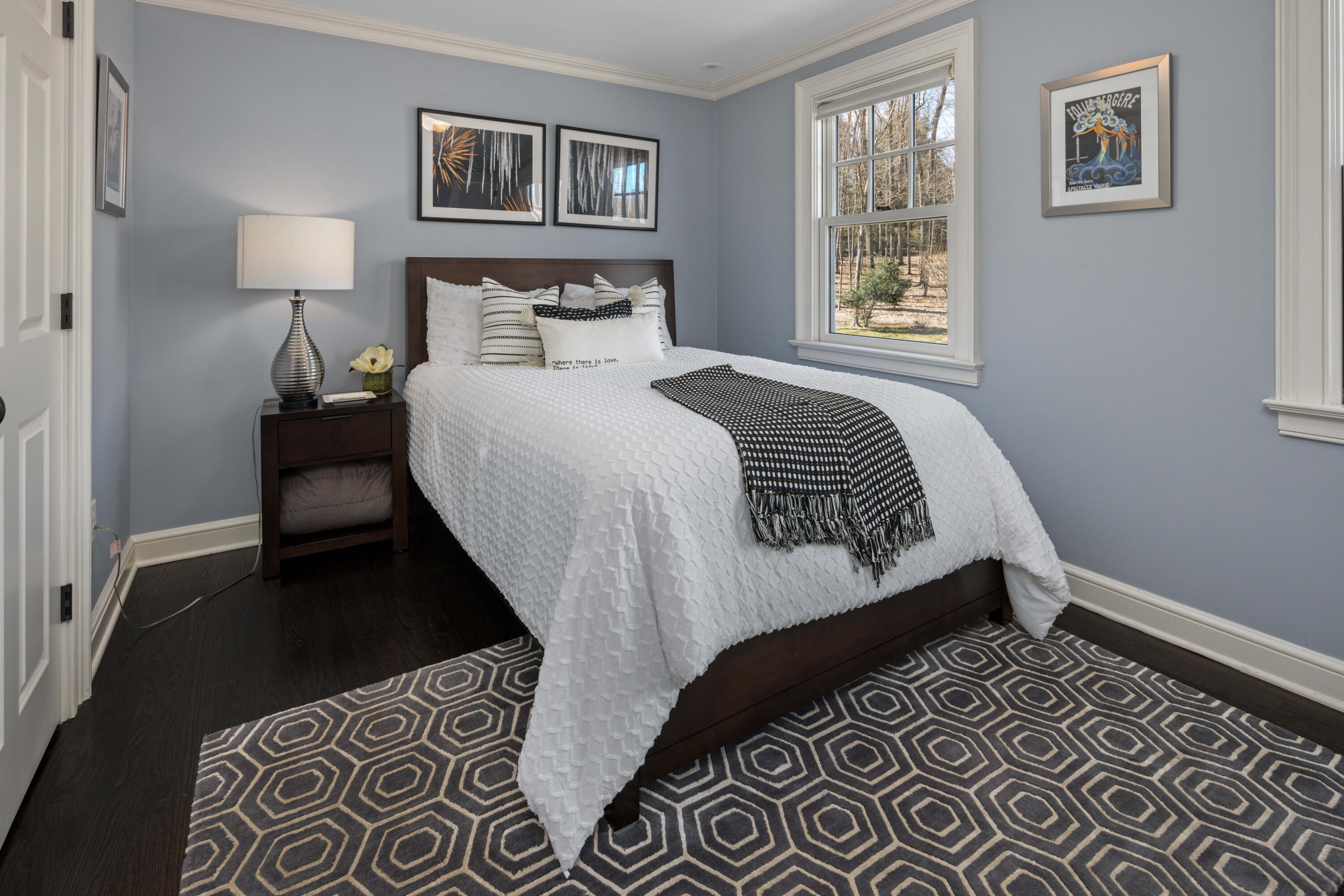 8 Hanson Road Darien, CT 06820 - Photo 25 of 38 a bedroom with a bed and a window