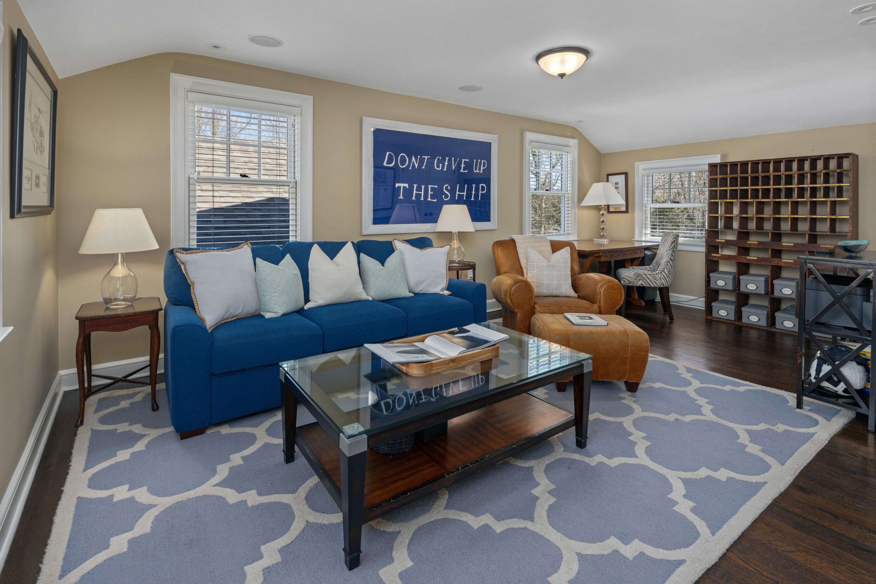 8 Hanson Road Darien, CT 06820 - Photo 26 of 38 a living room with furniture and a window