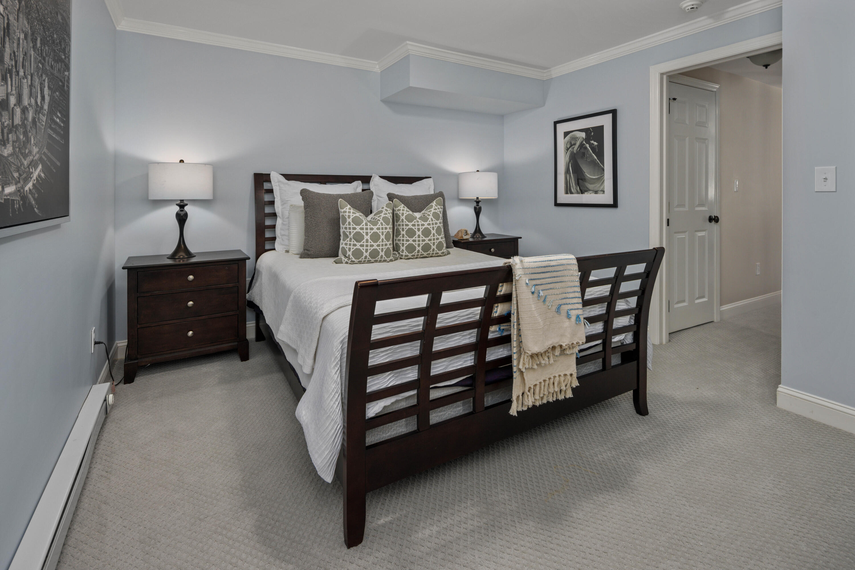 8 Hanson Road Darien, CT 06820 - Photo 28 of 38 a bedroom with a bed and a night stand