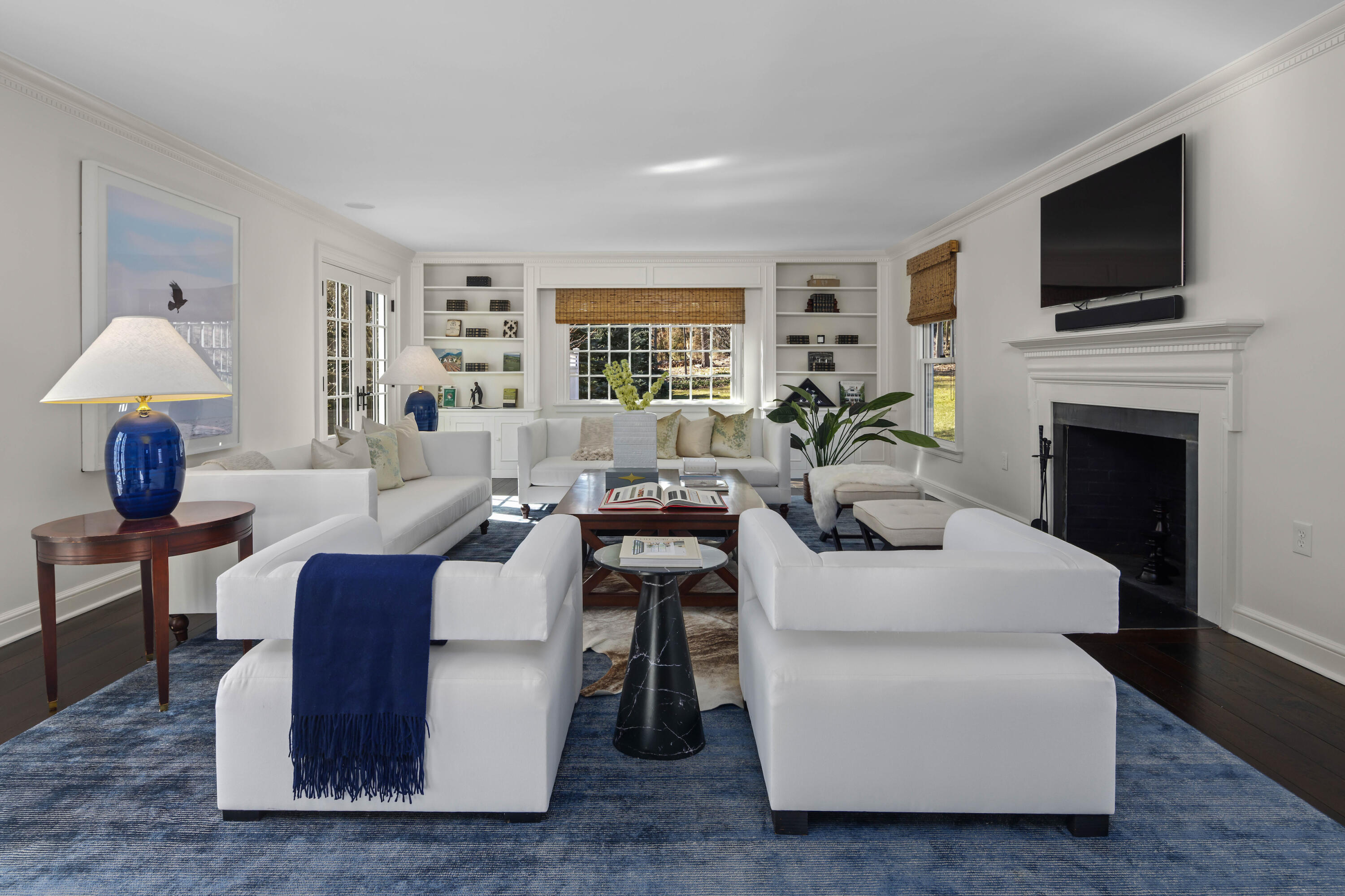 8 Hanson Road Darien, CT 06820 - Photo 4 of 38 a living room with fireplace furniture and a flat screen tv