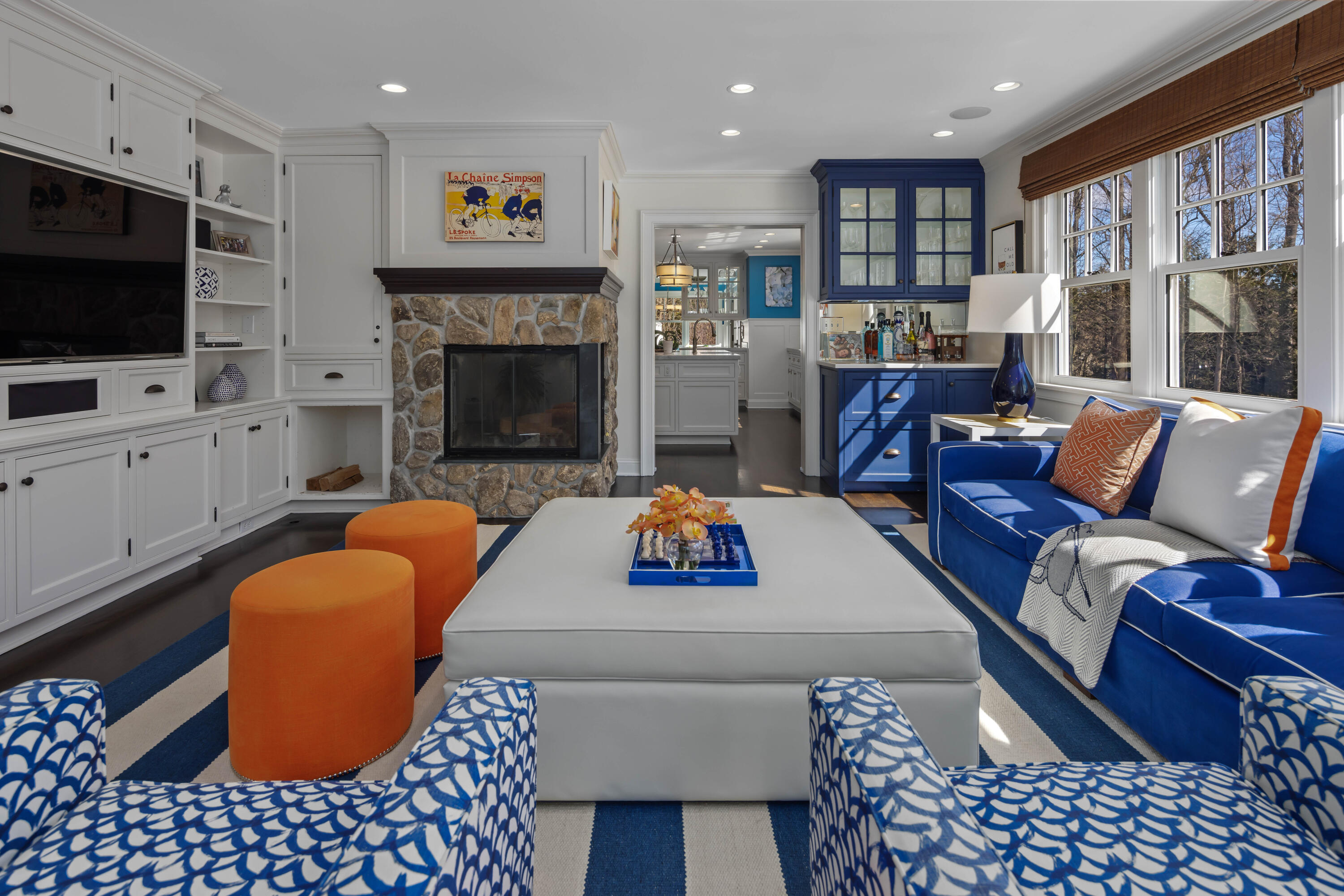 8 Hanson Road Darien, CT 06820 - Photo 5 of 38 a living room with furniture a flat screen tv and a fireplace