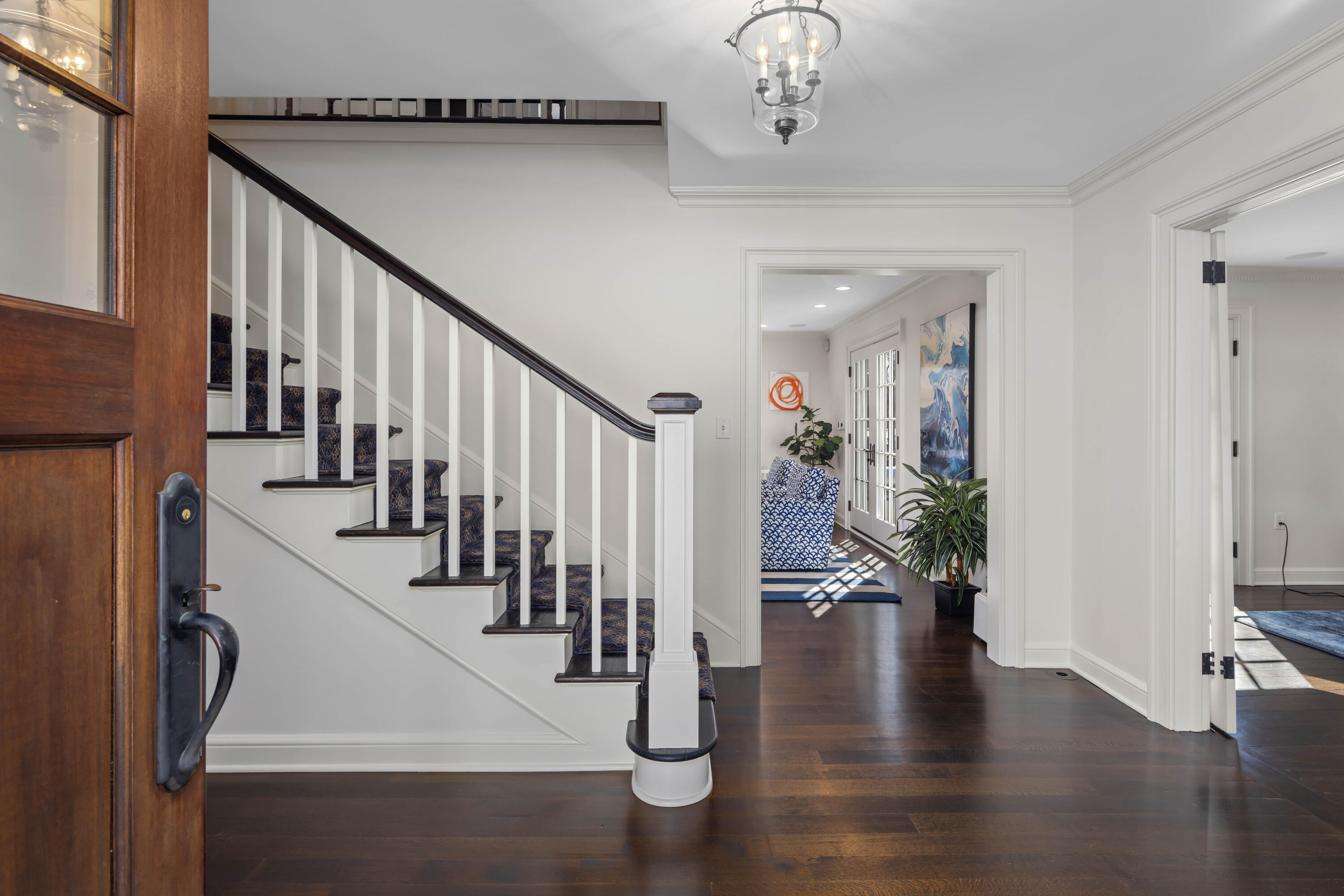 8 Hanson Road Darien, CT 06820 - Photo 7 of 38 a view of entryway and hall with wooden floor