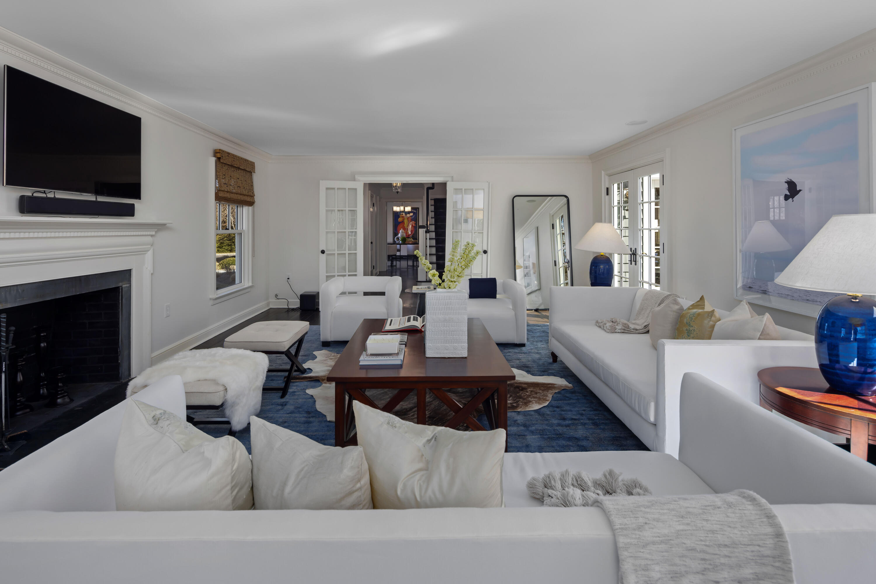 8 Hanson Road Darien, CT 06820 - Photo 10 of 38 a living room with fireplace furniture and a flat screen tv