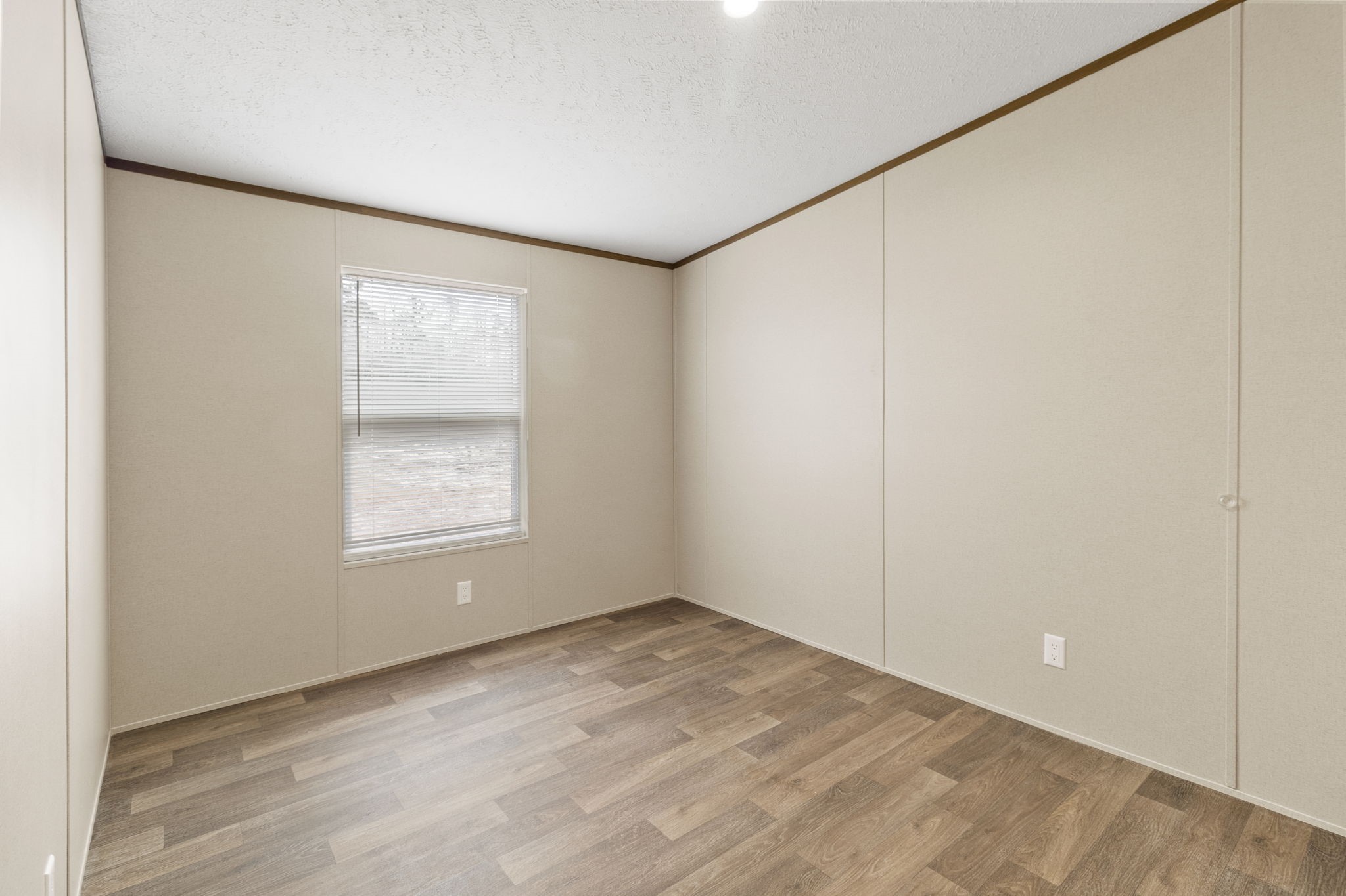 245 Rustic Way Livingston, TX 77351 - Photo 15 of 33 an empty room with a window