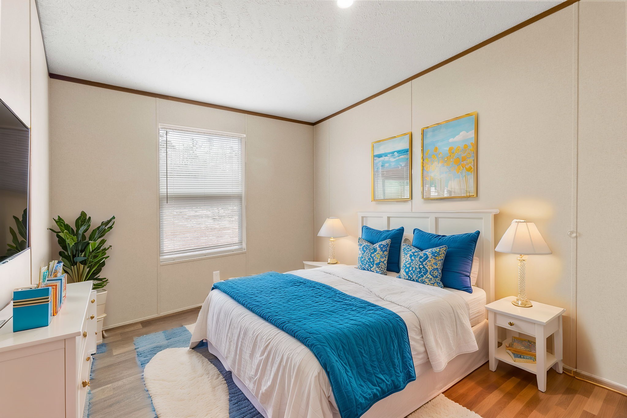 245 Rustic Way Livingston, TX 77351 - Photo 16 of 33 a bedroom with a bed and a potted plant