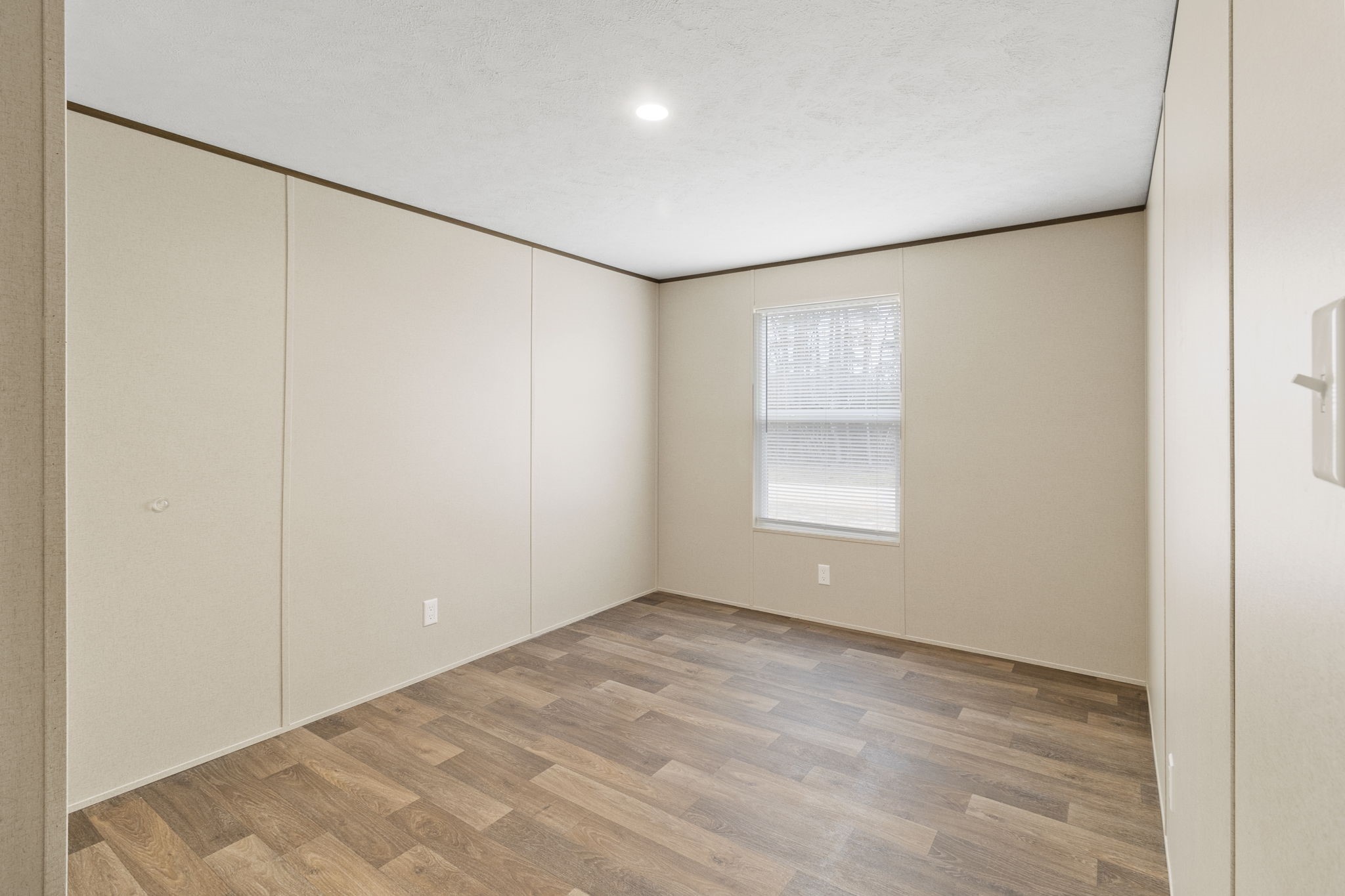 245 Rustic Way Livingston, TX 77351 - Photo 18 of 33 a view of an empty room with a window
