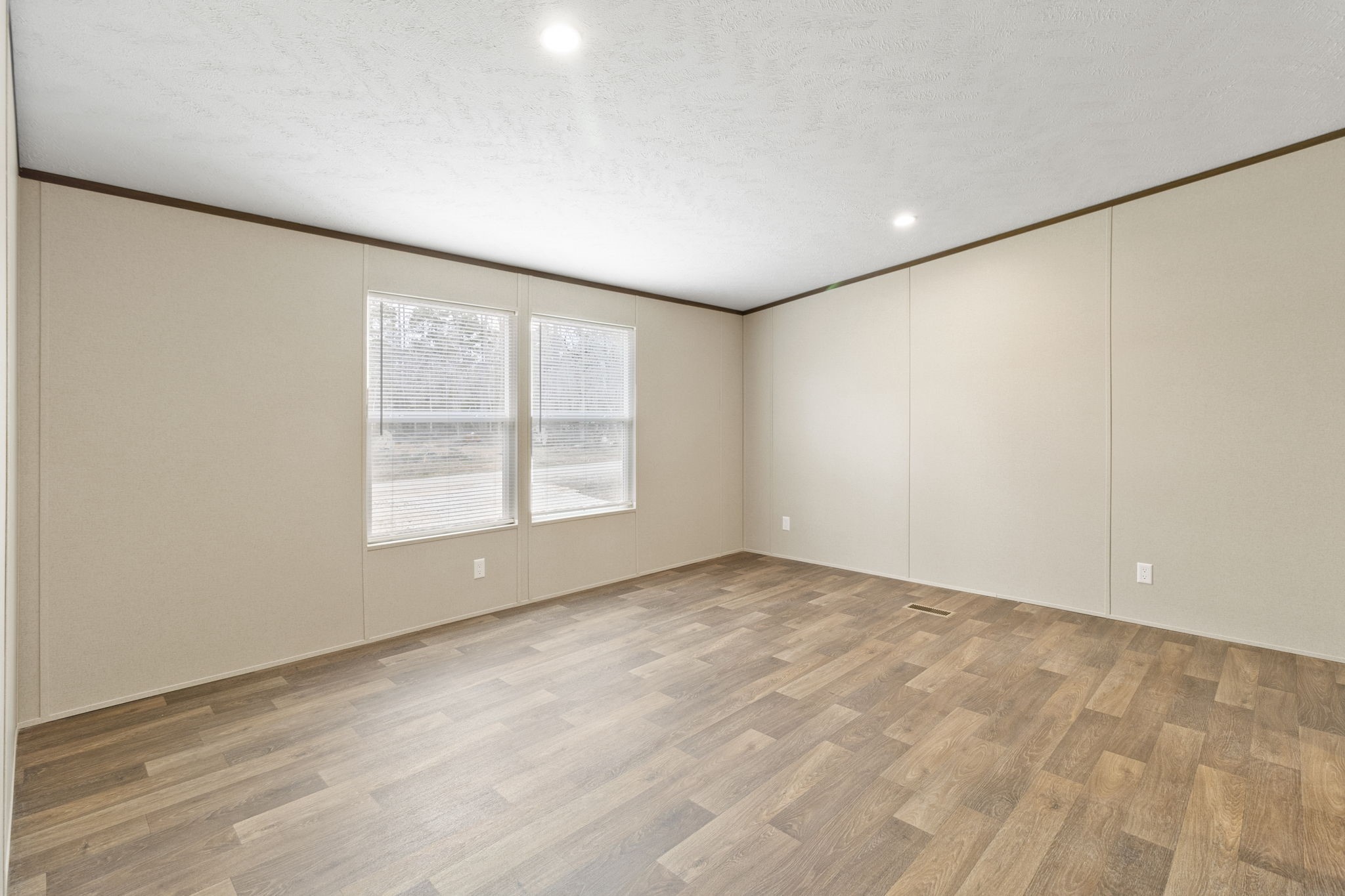 245 Rustic Way Livingston, TX 77351 - Photo 22 of 33 an empty room with windows