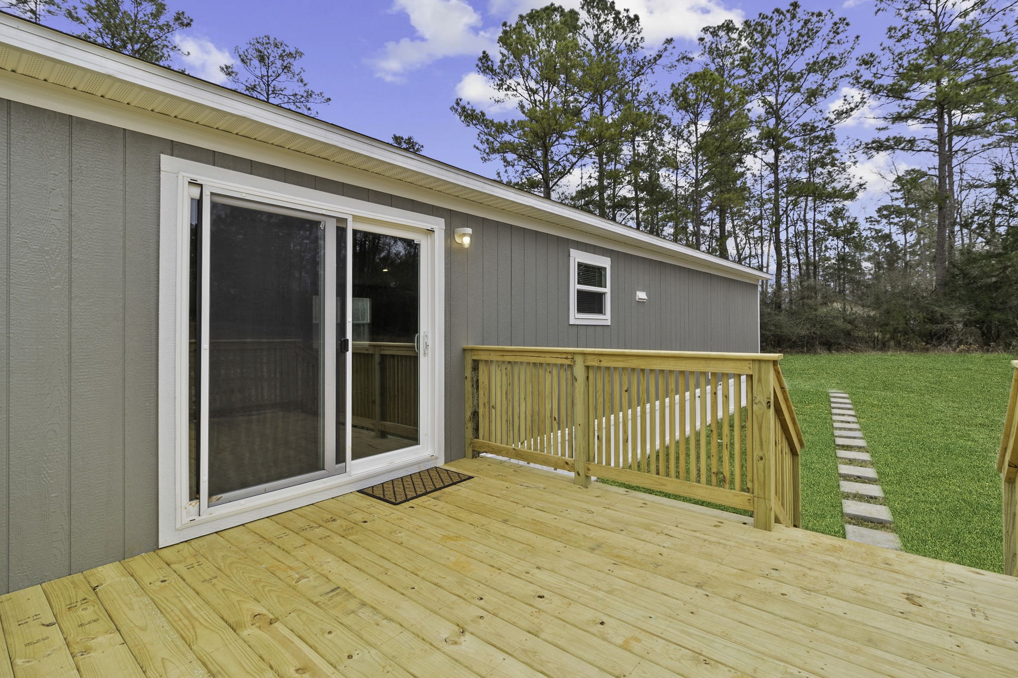 245 Rustic Way Livingston, TX 77351 - Photo 27 of 33 a view of a house with a backyard