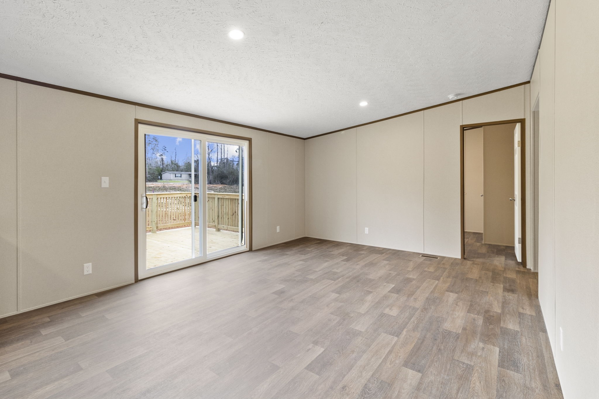 245 Rustic Way Livingston, TX 77351 - Photo 10 of 33 an empty room with windows and closet