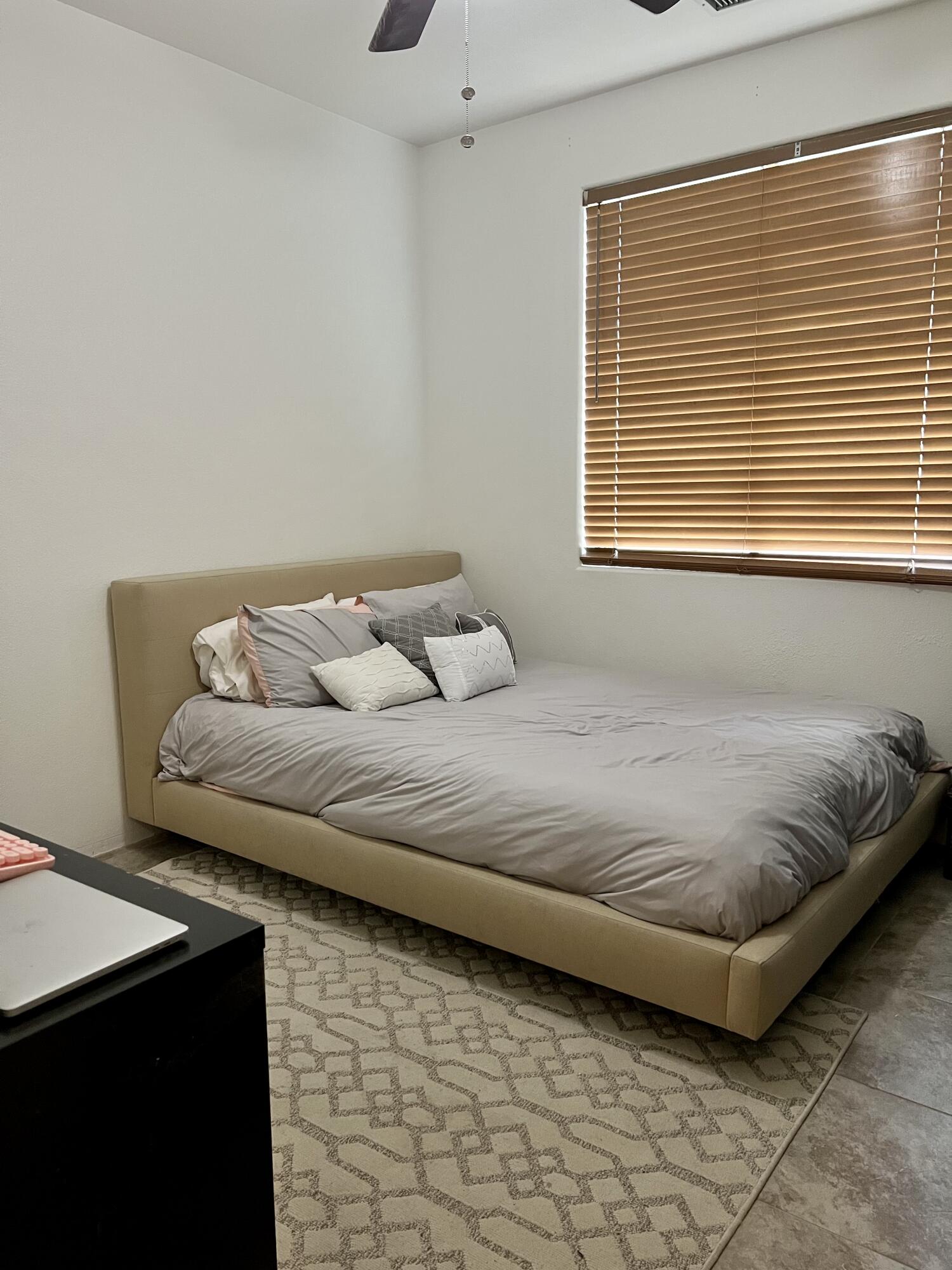 46450 Calle Raphael Indio, CA 92201 - Photo 20 of 33 a bedroom with a bed and a window