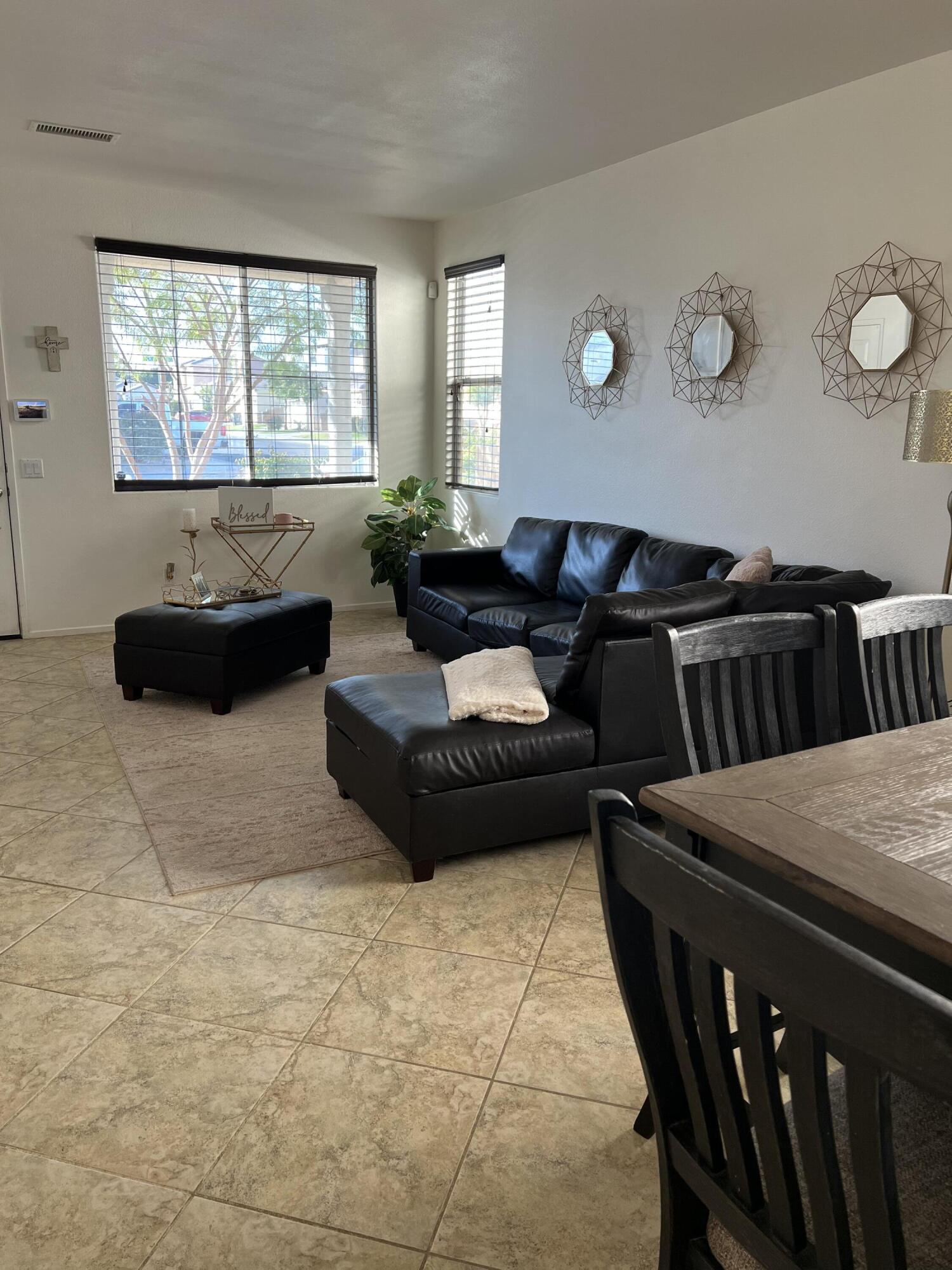 46450 Calle Raphael Indio, CA 92201 - Photo 2 of 33 a living room with furniture and a large window
