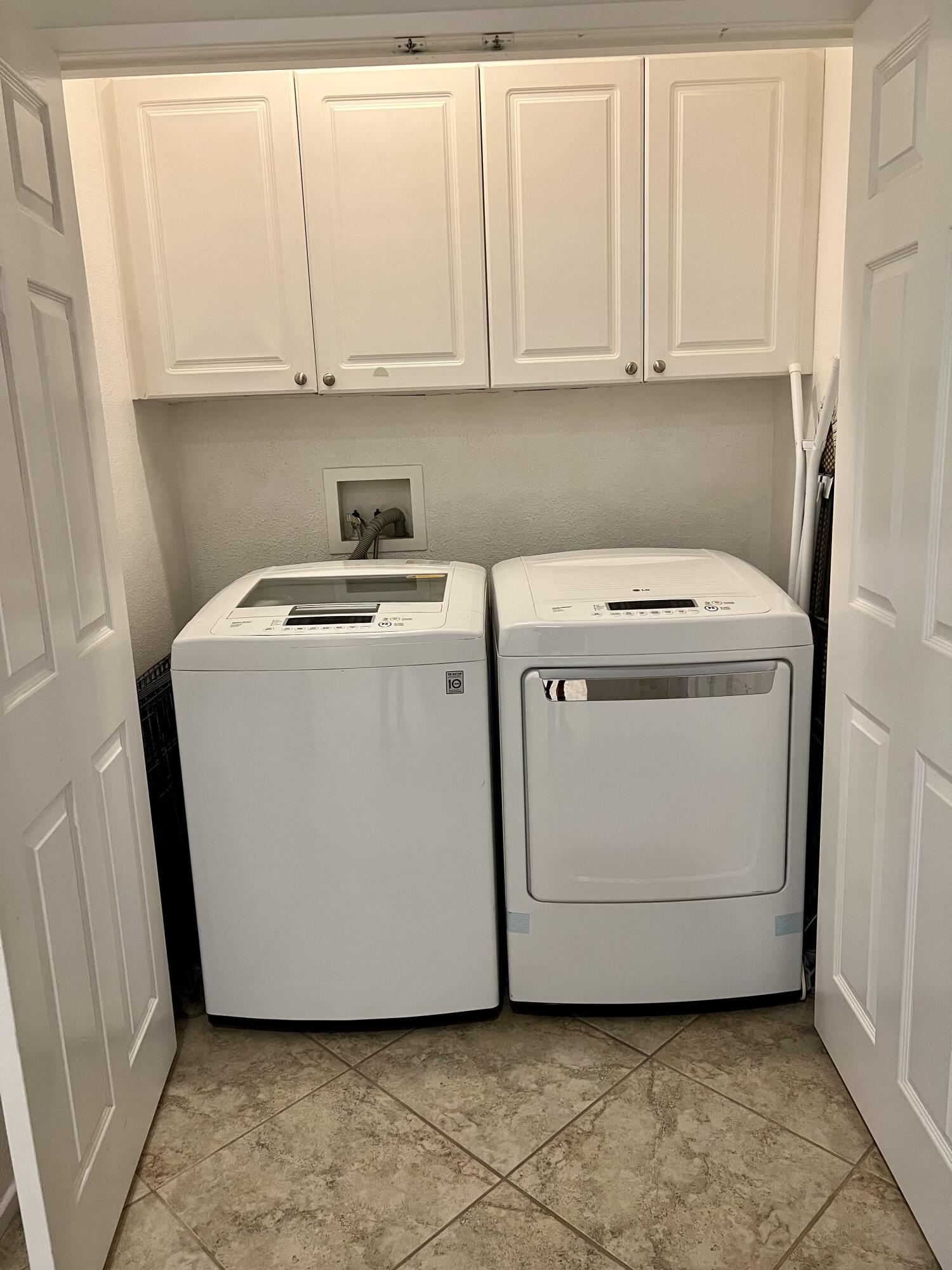 46450 Calle Raphael Indio, CA 92201 - Photo 25 of 33 a utility room with dryer and washer