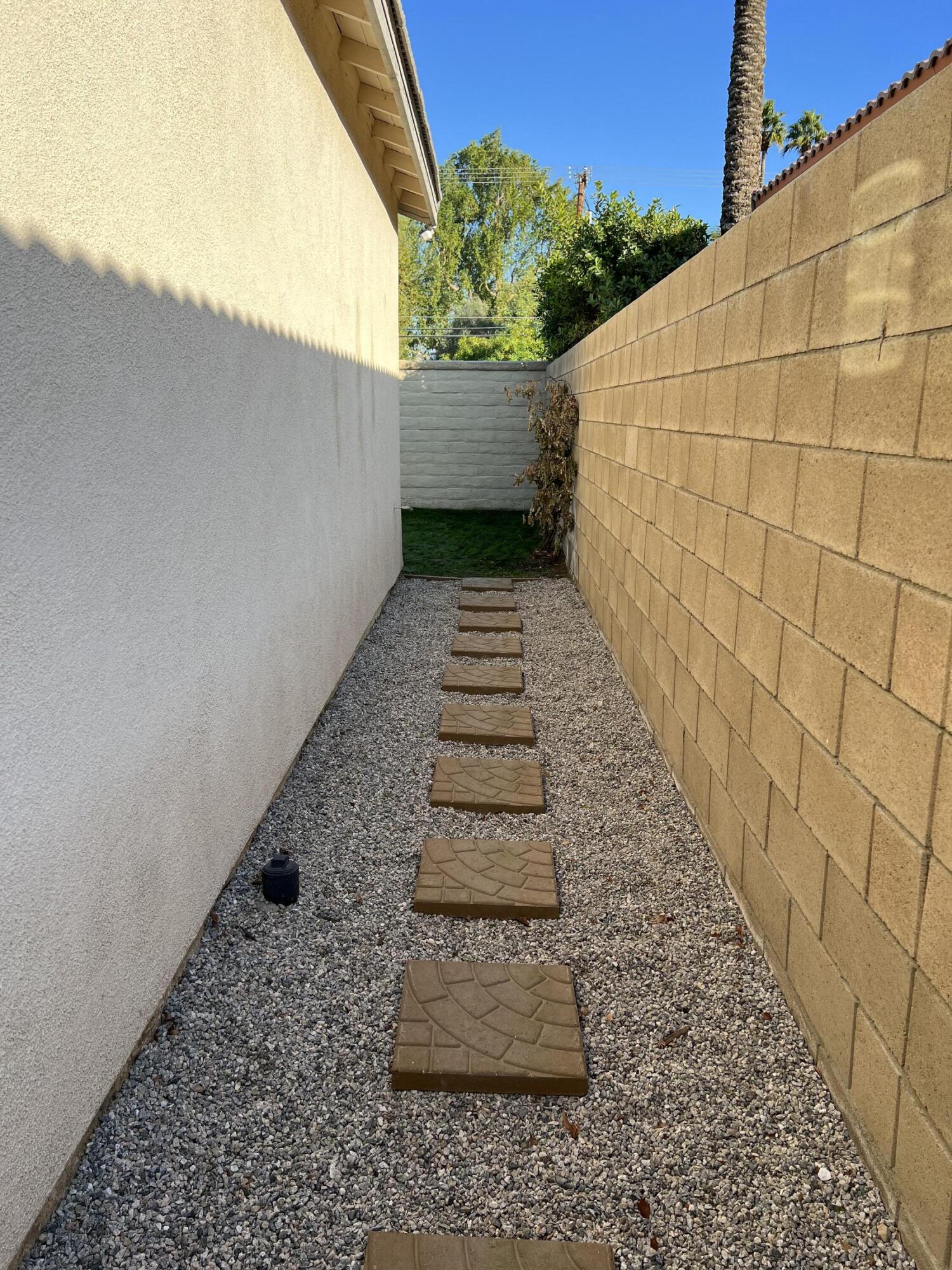 46450 Calle Raphael Indio, CA 92201 - Photo 28 of 33 a view of a pathway both side of building