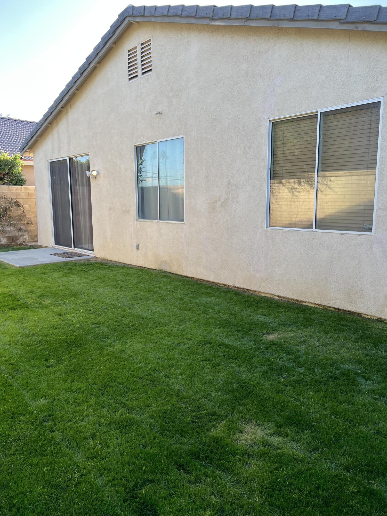 46450 Calle Raphael Indio, CA 92201 - Photo 29 of 33 a front view of a house with garden