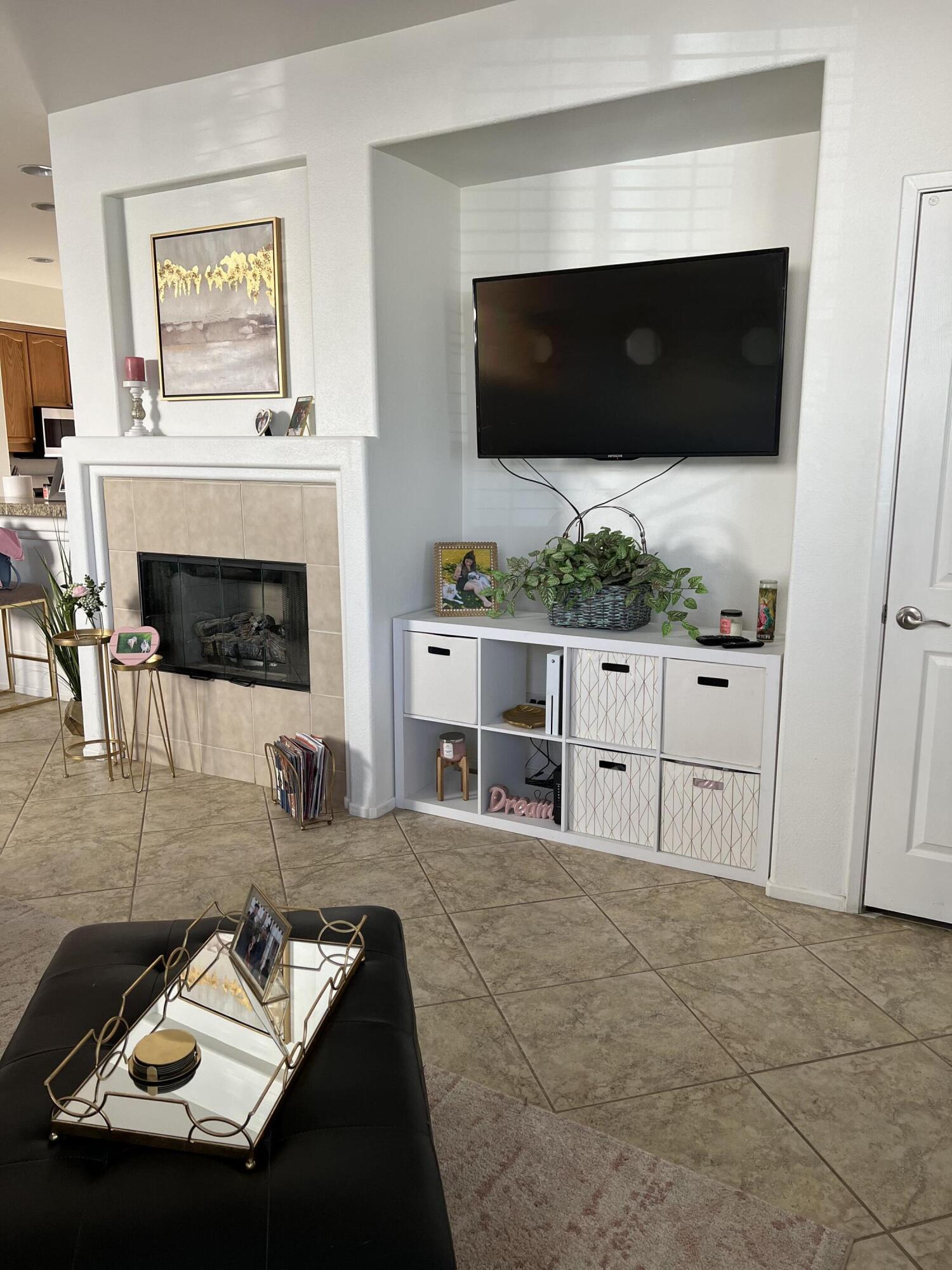46450 Calle Raphael Indio, CA 92201 - Photo 6 of 33 a living room with furniture and a flat screen tv
