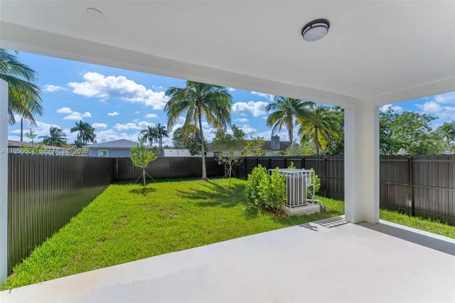 a view of a garden with a fountain