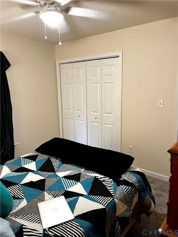 a black and white checkered floor with a black white umbrella