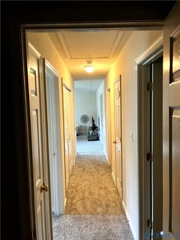 a view of hallway with livingroom and bedroom