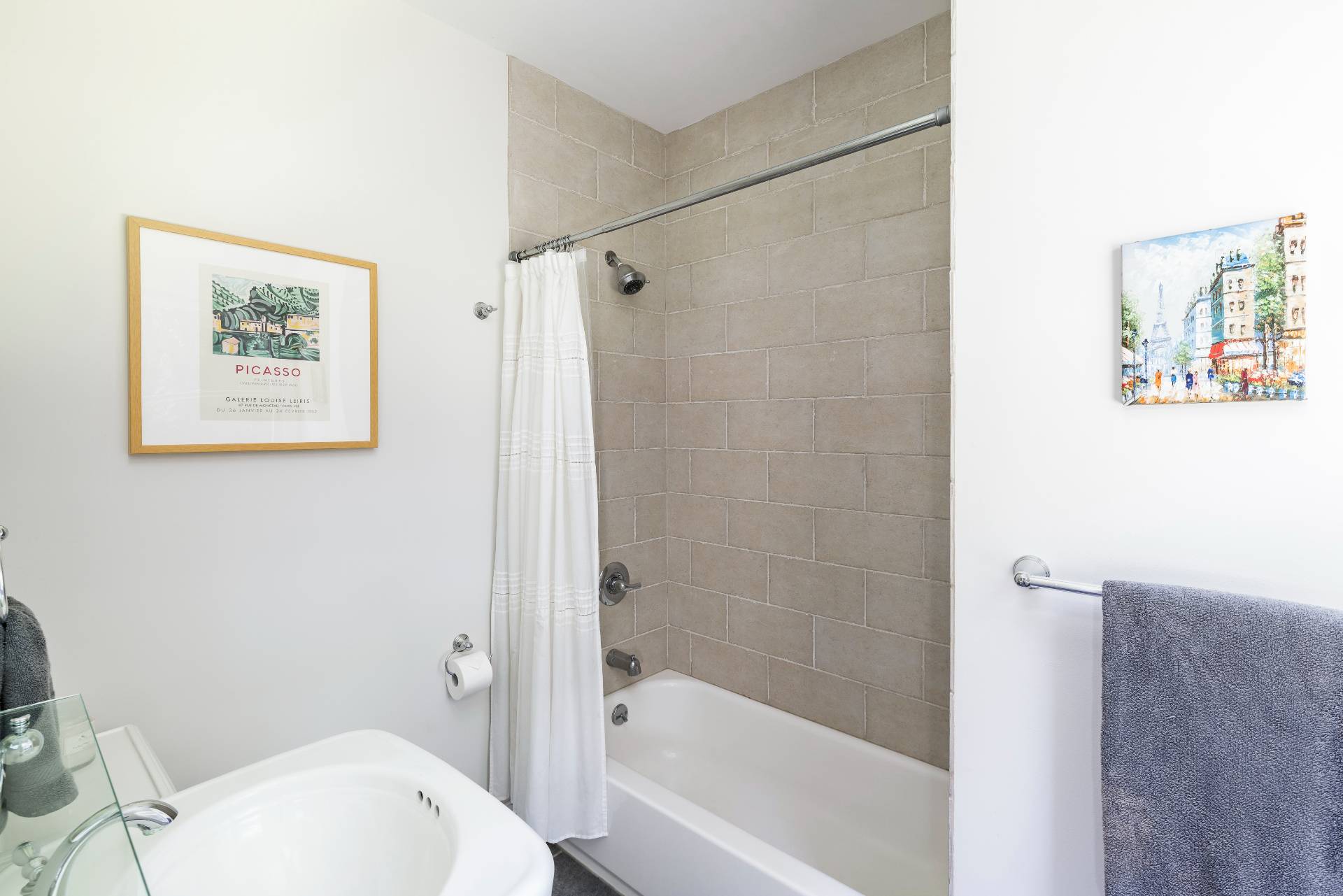 35 Glade Road East Hampton, NY 11937 - Photo 16 of 16 a white bath tub sitting next to a white toilet