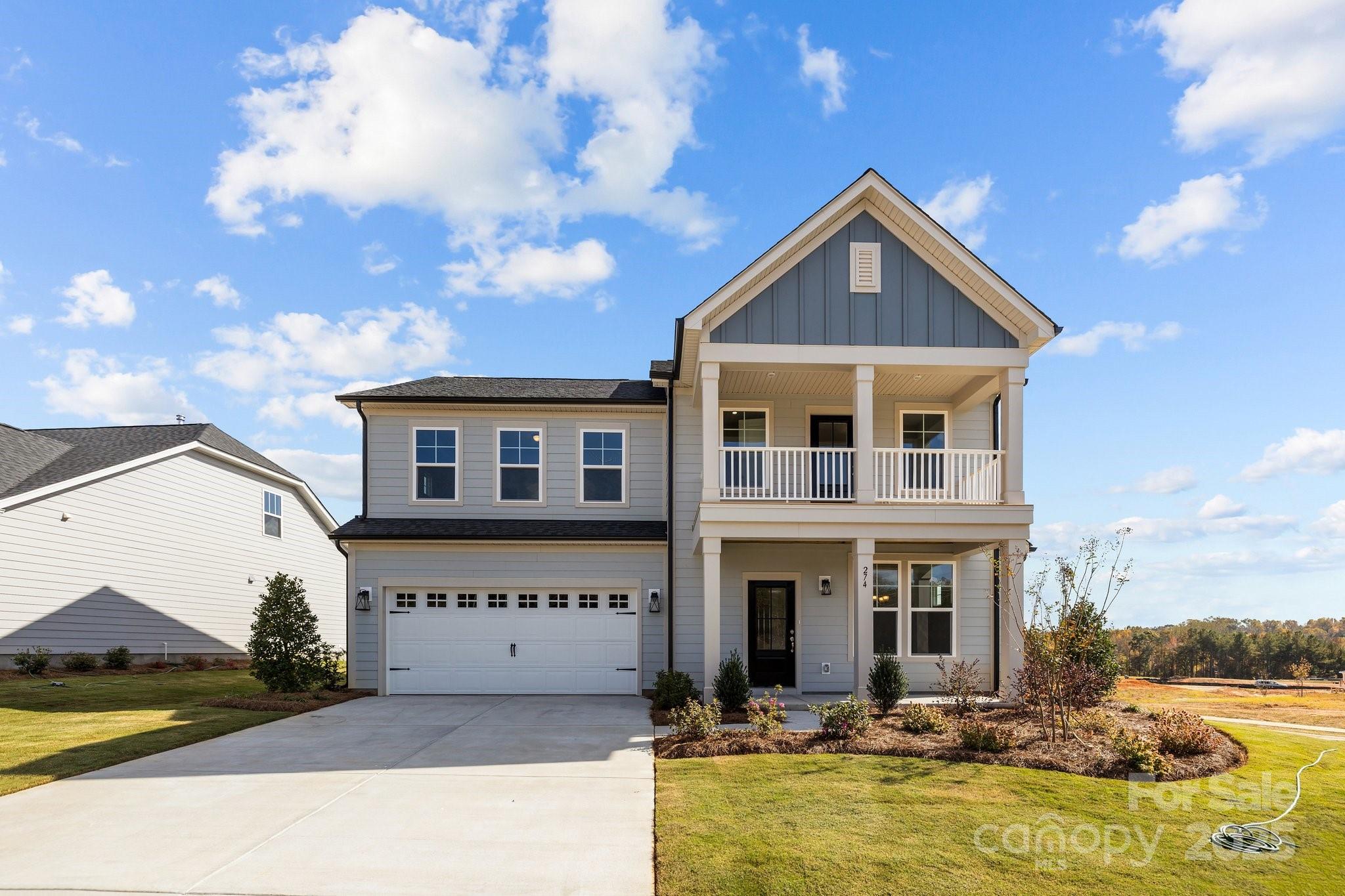 733 Sirius Lane, Unit 92 York, SC 29745 - Photo 1 of 18 a view of a house with swimming pool and sitting area