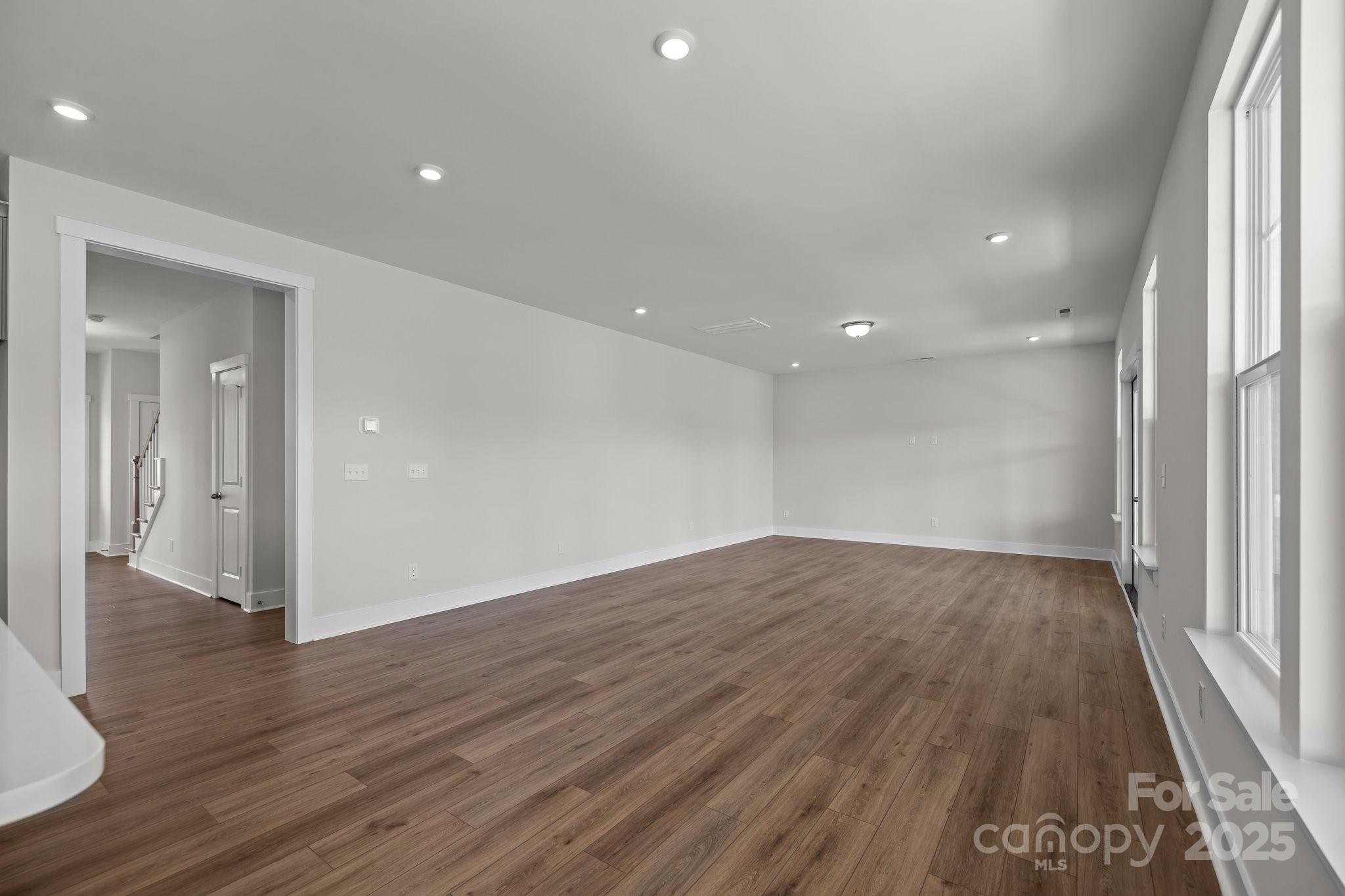 733 Sirius Lane, Unit 92 York, SC 29745 - Photo 4 of 18 a view of empty room with wooden floor