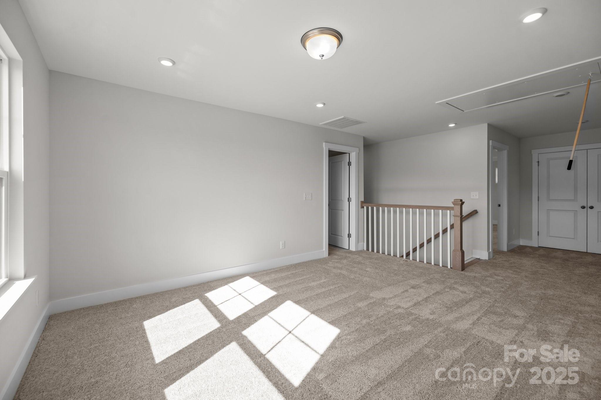 733 Sirius Lane, Unit 92 York, SC 29745 - Photo 5 of 18 an empty room with windows