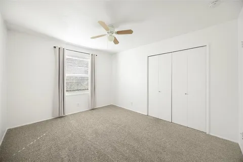 a bathroom with a sink toilet a mirror and shower