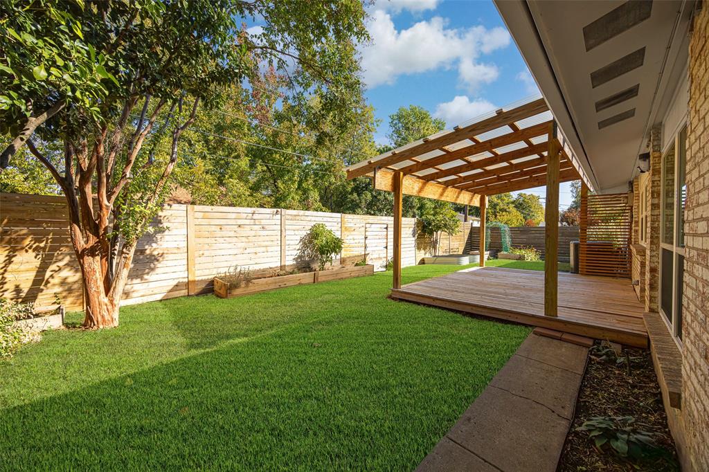812 Sherbrook Drive Richardson, TX 75080 - Photo 23 of 28 a view of a porch with a backyard