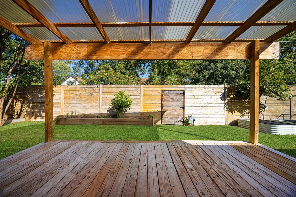 812 Sherbrook Drive Richardson, TX 75080 - Photo 24 of 28 a view of yard with a deck