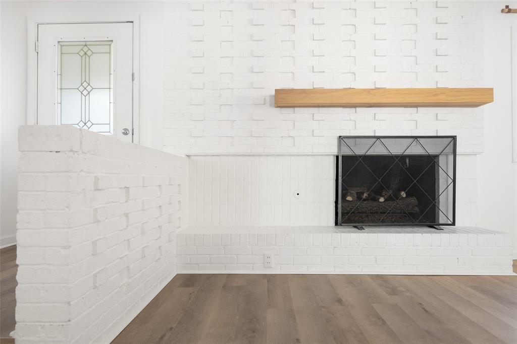 812 Sherbrook Drive Richardson, TX 75080 - Photo 5 of 28 close up of a fireplace