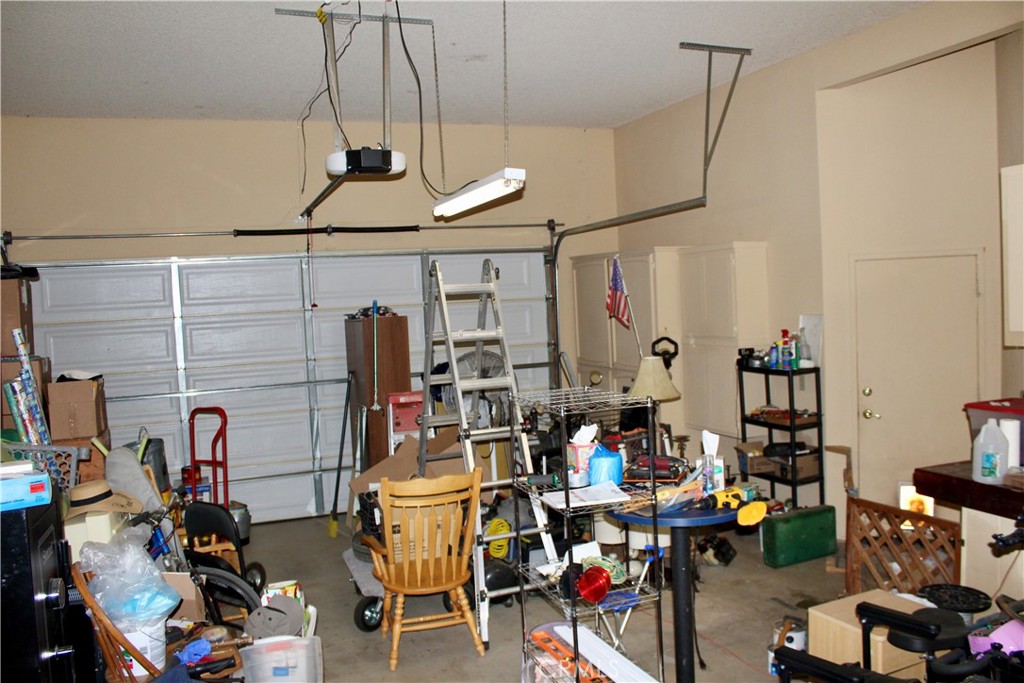 945 Nielson Road Pinon Hills, CA 92372 - Photo 24 of 51 Oversized garage with extra tall roll up door