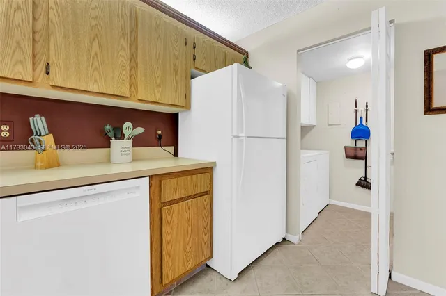 a bath room with a toilet and a shower curtain