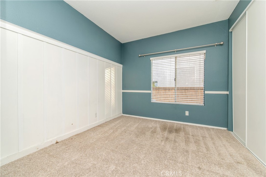6771 Galveston Place Rancho Cucamonga, CA 91701 - Photo 18 of 38 a view of an empty room with a window