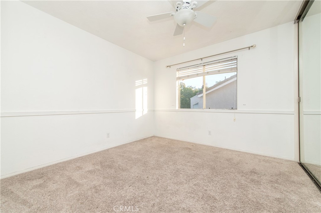 6771 Galveston Place Rancho Cucamonga, CA 91701 - Photo 23 of 38 an empty room with a window