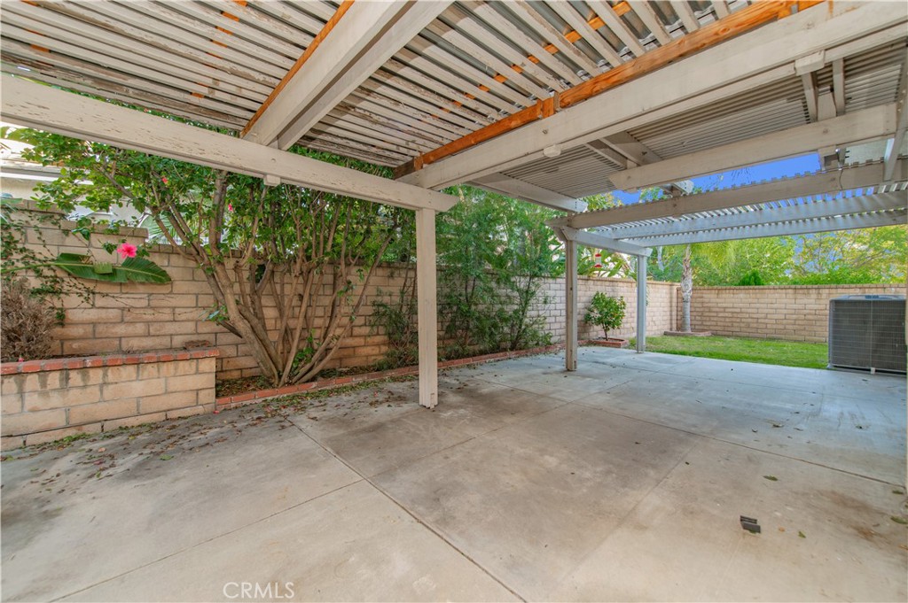 6771 Galveston Place Rancho Cucamonga, CA 91701 - Photo 30 of 38 a view of a backyard with a small cabin